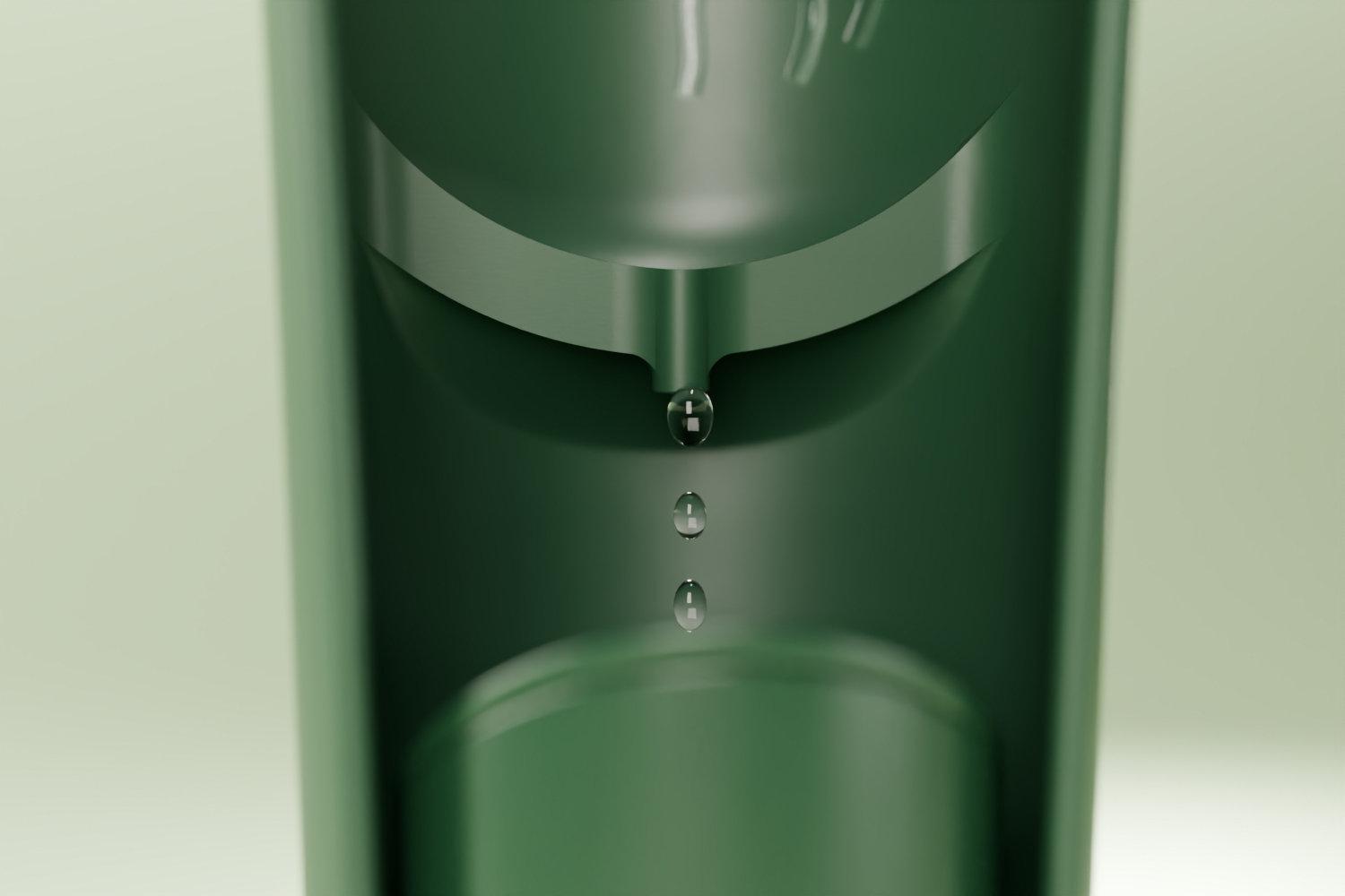 Rainwater dripping from the RainBloom's spout into the pitcher